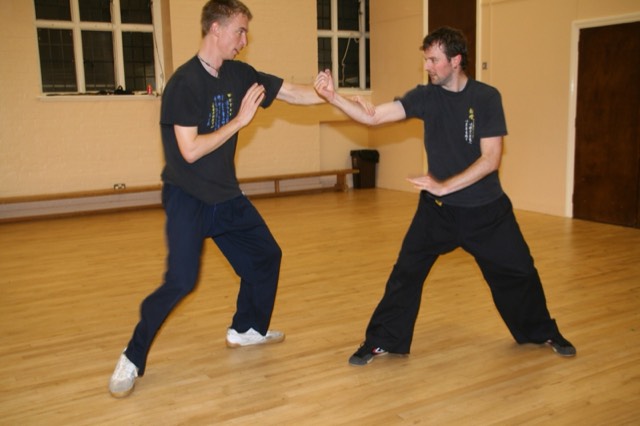 Two students practising a two-person drill