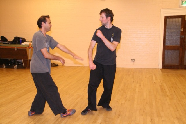 Sensing hands: two students moving in contact